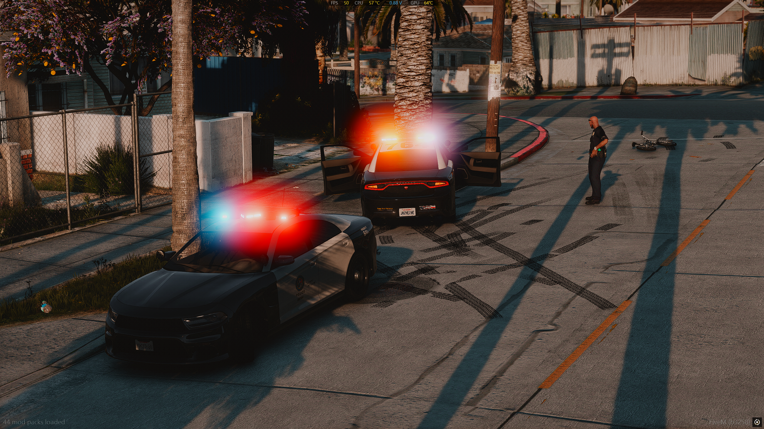 Officers shaking hands and smiling.